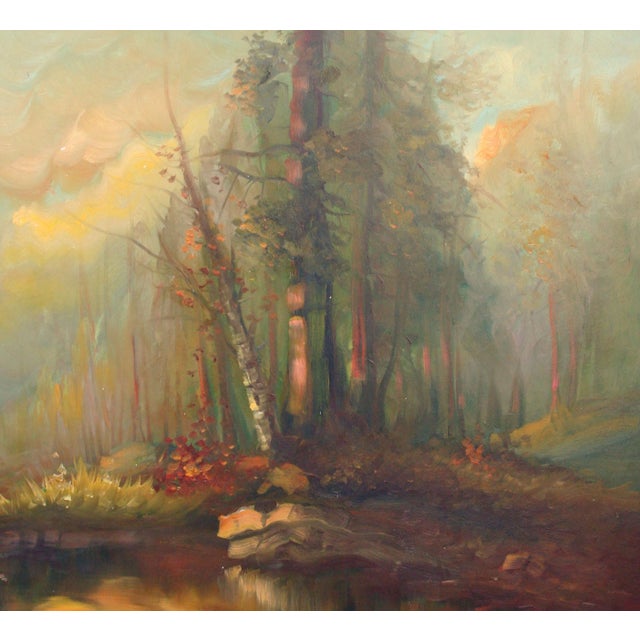 Stunning forest landscape of trees reflecting in water at sunset by Charles Grove (American, 20th Century). Signed...