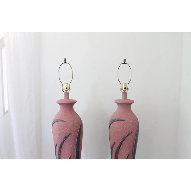 Make a bold retro statement with this incredible pair of vintage floor lamps! With their sculptural, vase-like silhouettes...