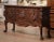 Bring impressive scale and sculptural craftsmanship to a dining room, library, or grand entry with this exceptional...