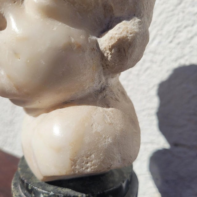17th Century White Marble Putto Head on a Column For Sale - Image 10 of 18