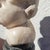 17th Century White Marble Putto Head on a Column For Sale - Image 10 of 18