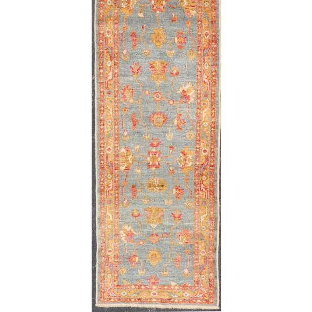 Measures: 2'7 x 14'0 Turkish Angora Oushak Runner with Denim Blue Field and Rust Motifs. Keivan Woven Arts. rug /AN-123689...