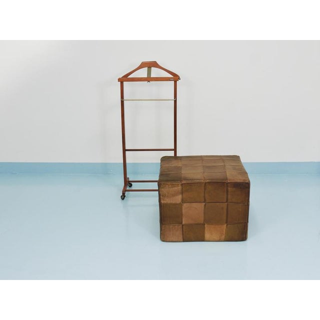A beautiful authentic mid-century modern cube-shaped stool, pouf, or ottoman / footrest from the 1970s, produced by the...