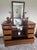 An absolute triumph of early 20th-century American cabinetmaking, this investment-grade drop-center wishbone vanity...