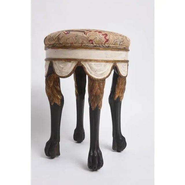 This stylish and chic Italian stool by Dennis & Leen is hand carved and hand painted, with swagged fabric and stylized...