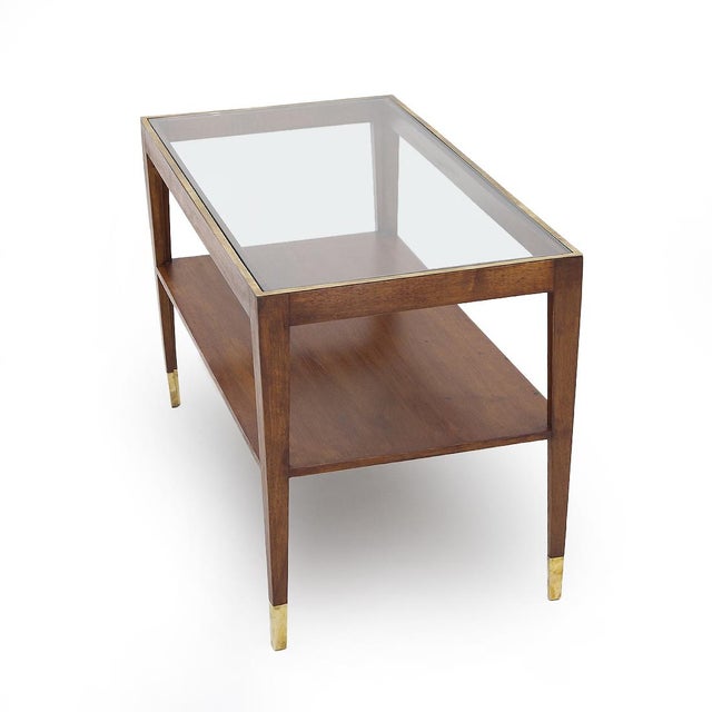 Walnut coffee table with brass feet and glass top, attributed to Gio Ponti.