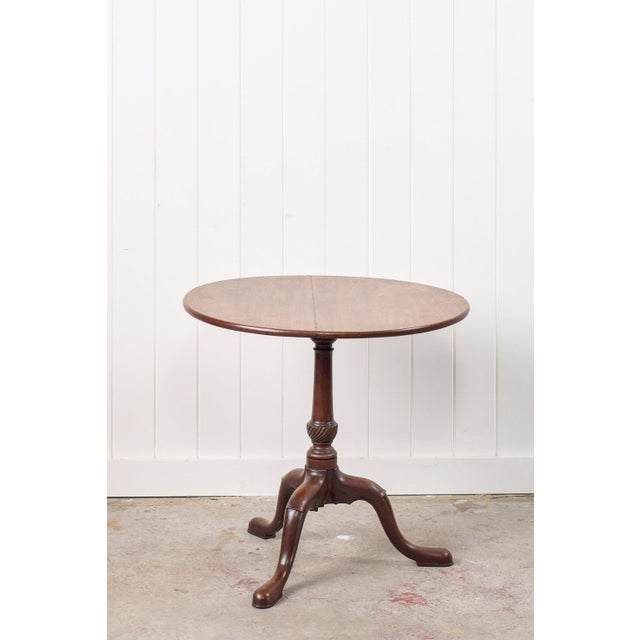 DETAILS include tilt top mechanism, carved stem, along with padded feet and beautiful coloring throughout the top.&nbsp;