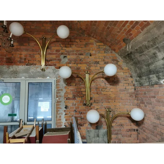 Mid-Century Sconce in Metal & Milk Glass, in Good conditions. Designed 1960 to 1969 Up to 250V (Europe/UK Standard).The...