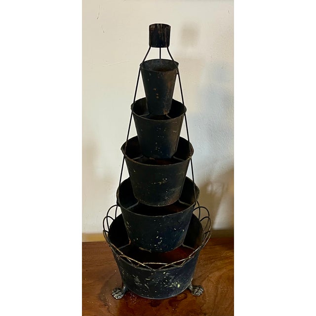 Antique 19th century French tole graduated six-tiered centerpiece for arranging flowers. Old black painted chippy surface....