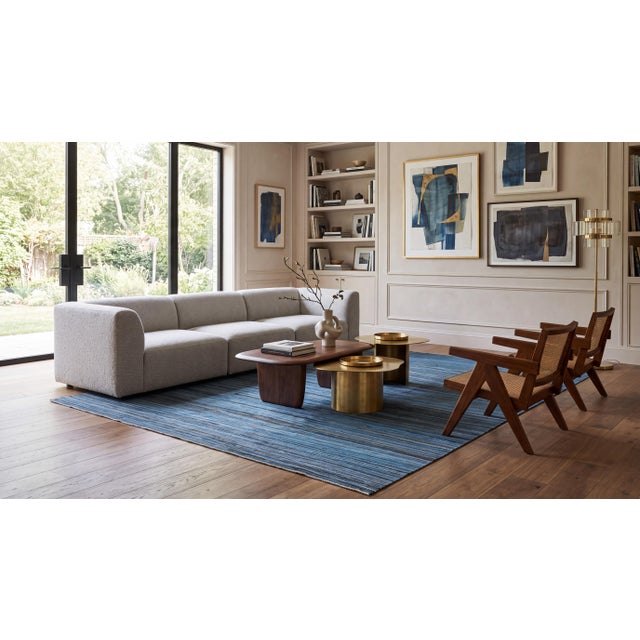 Elevate your space with this understated Modern Kilim Wool Rug, showcasing a rich palette of deep indigo, slate, and...