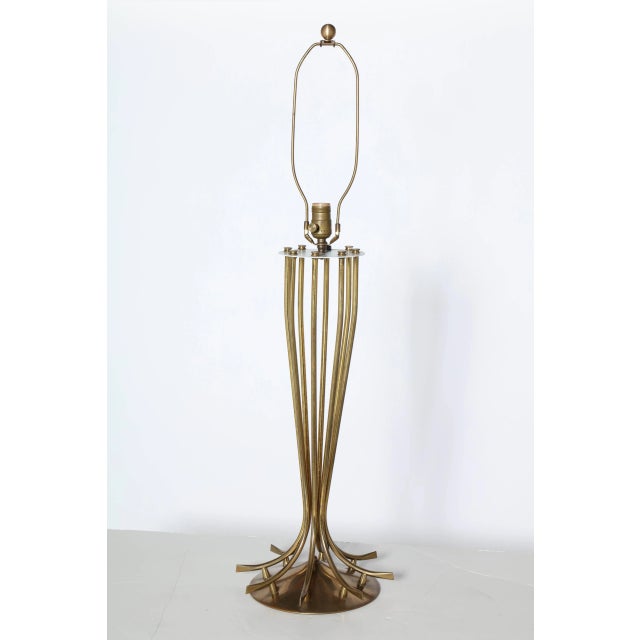 Substantial French Modern Brass Table Lamp. Featuring a patinated Brass low corseted form, eight radiating spokes,...