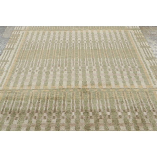 Hand-knotted in wool, this 6x9 rug is a sophisticated addition to Rug & Kilim’s Art Deco collection. This piece functions...