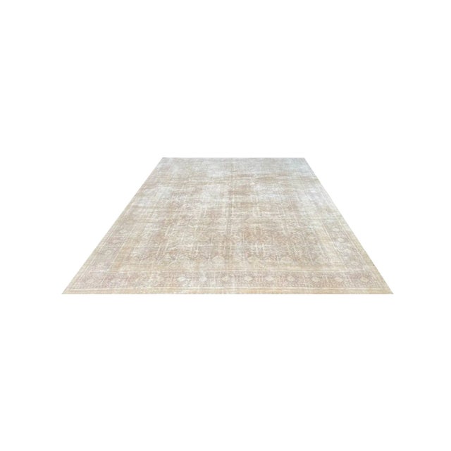 Exact Size: 9’9″ x 12’11” Color: Brown Age: Old Materials: Wool Construction: Hand Knotted Origin: Iran