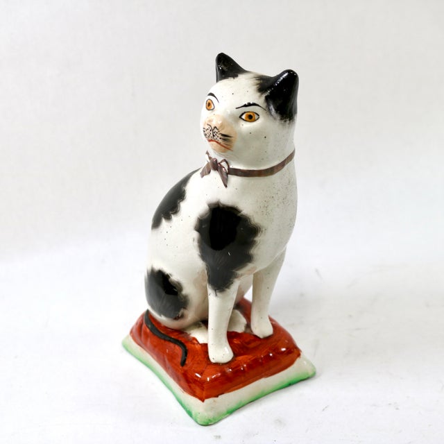 Amazing 1920's Staffordshire Ware black and white cat on a pillow by William Kent. Figurine is marked number 67. This...