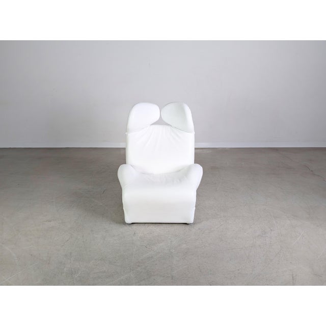 We are offering a beautiful Cassina Wink Chair in white leather for sale. This chair is considered a true design classic...