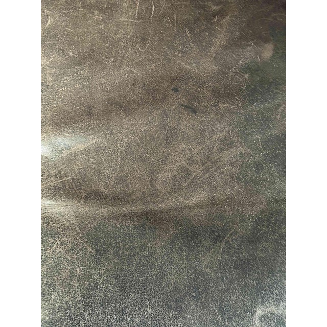 Vintage Crate and Barrel leather sleeper sofa. Angled back and deep seat cushions filled with a plush feather-down blend...