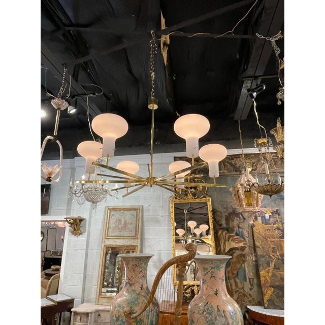 Modern Italian brass and glass 6-light chandelier. Circa 2000. Perfect for today's transitional designs!