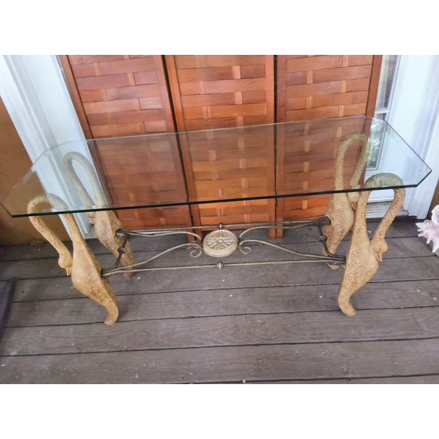 1970s Hollywood Regency Mixed-Metal Swan Coffee Table with Beveled Heavy Glass Top Add a striking touch of mid-century...