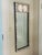 This vintage wooden mirror is embellished with beautiful shells. Neutral in color, great tall narrow size, this is a good...