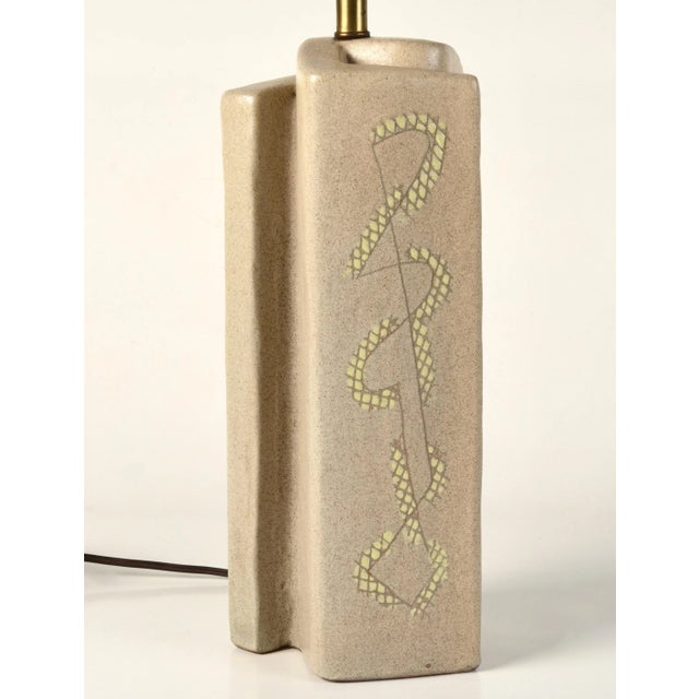 Pottery lamp by Marianna Von Allesch. Overall Measurements: Height to top of harp: 29.75" Width: 6" Depth: 5.5"
