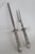 This gorgeous Roast Serving Utensil Pair is silver plated. This stunning carving set includes a sharpening steel and two-...