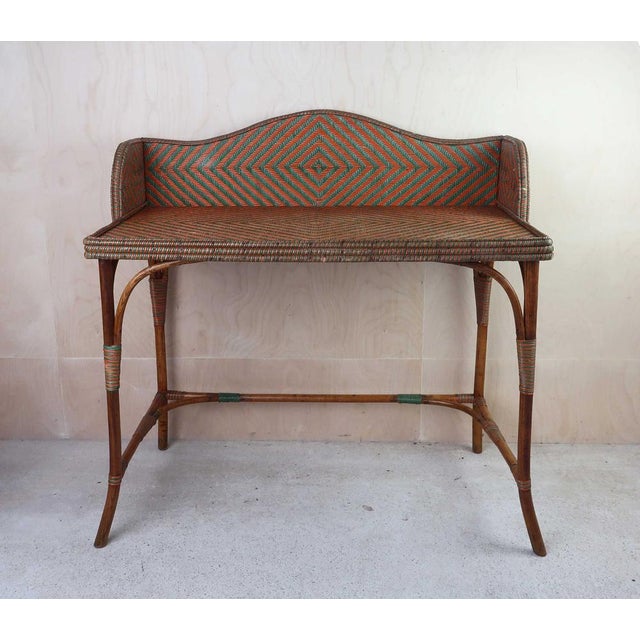 Wonderful Art Deco console table Painted rattan. Original paint. Good condition. The measurement given is to the height of...