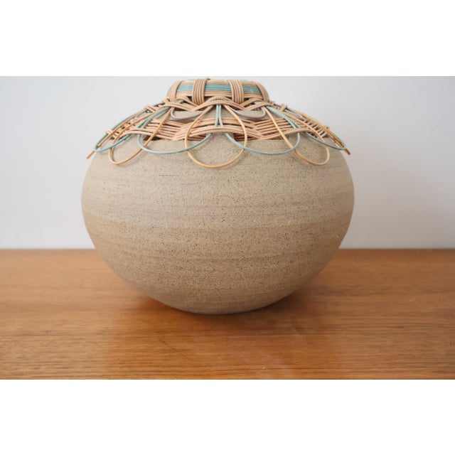 A striking piece of American studio craft — signed and dated 2007 by ceramic artist Hilda Kidd Wiesenmeyer. The bulbous,...