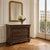19th Century Napoleon III Neoclassical Rosewood Commode with Original Carrara Marble was designed with the quiet strength...