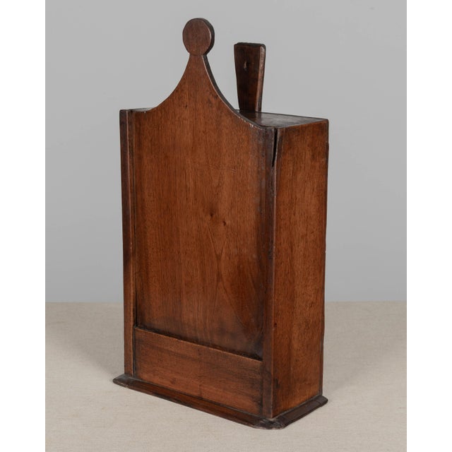 A 19th century French fariniere, made of walnut. Good craftsmanship using dovetailed construction. Minor losses to front...
