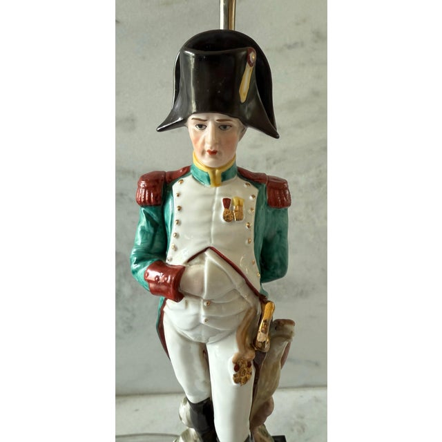 Mid century lamp made from a hand painted Capodimonte figurine of Napoleon Bonaparte with an eagle mounted on a wood base....