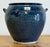 Vintage pottery cachepot vessel with rich indigo blue speckled glaze. Handles to either side with impressed detail below...
