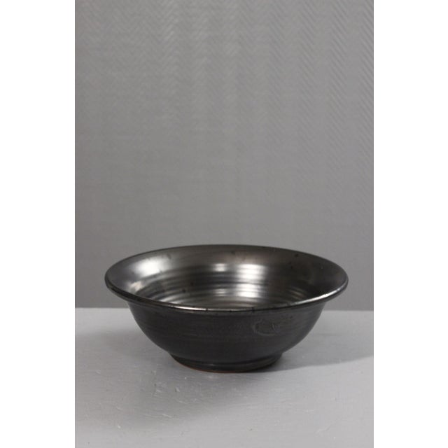 Earthenware fruit bowl, satin black enamel, attributed to Robert Picault. The enamel and clay used appear to match his...