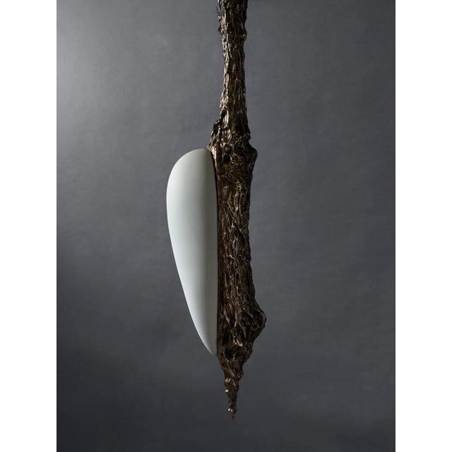 Lv-426 pendant in patinated cast bronze by william guillon hand sculpted, dated and signed dimensions: d 20 x w 14 x h 150...