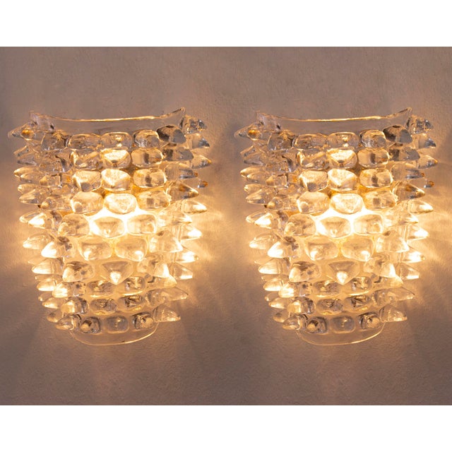 Beautiful large wall lamp with spikes, gold finish frame and thick and massive transparent murano glass. type: applique...