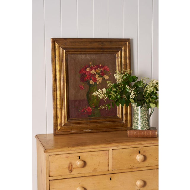 Original signed oil on canvas by Belgian artist Alphonse Van Beurden, depicting a floral still life. Presented in a gilt...