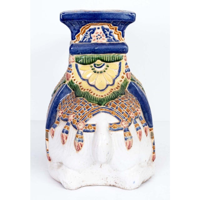 Painted Ceramic Camel Garden Stool. Good overall condition with slight wear to finish from age and use.