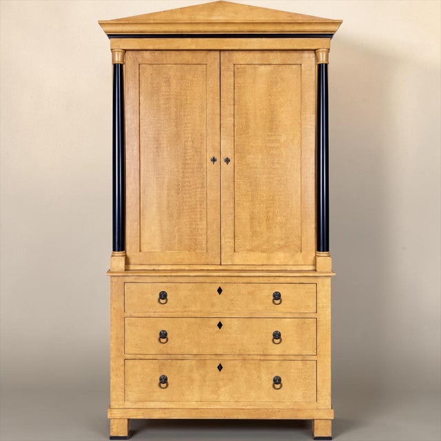 This is a late 20th century Biedermeier style Custom maple linen press cabinet or armoire. It was probably intended to be...