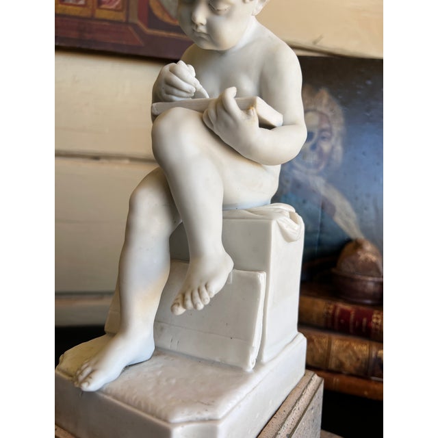 Early 20th Century Italian Porcelain Bisque Figure of a Putto Writing After Canova For Sale - Image 4 of 14