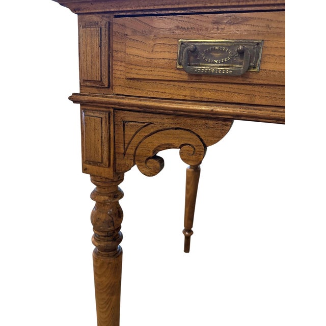 Beautiful Victorian-era writing desk or side table. It has a beautiful molded and paneled apron with fine decorative...