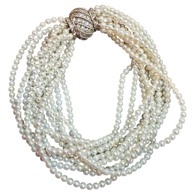 Akoya Japanies Pearl 12 Strand Bracelet, 14KWG Diamond Clasp, 8 inches The pearls, measuring approximately 3 to 3.2 mm,...