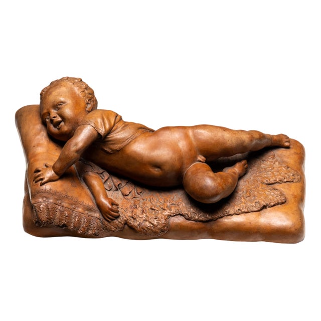 Reclining Infant in Terracotta by F. Sans For Sale