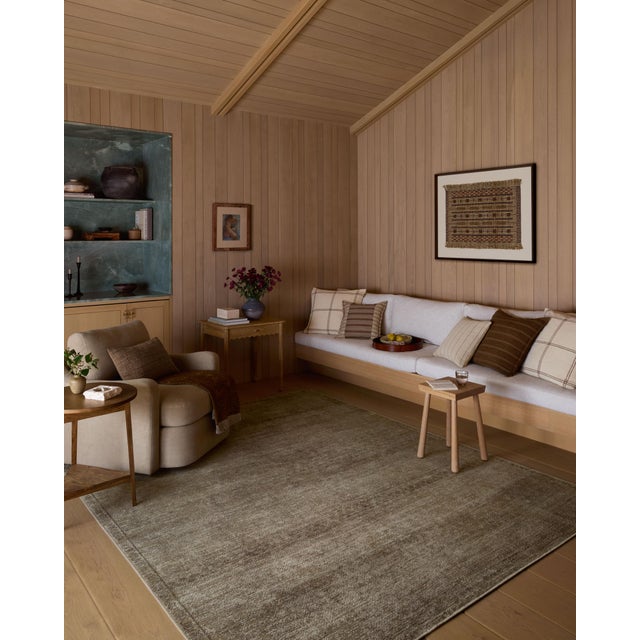 The Cambria Collection is a beautifully executed vintage-style area rug from Amber Lewis x Loloi with a blended jute and...