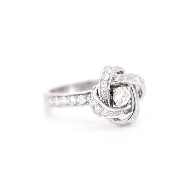 This engagement ring from Boucheron's Pivoine collection is crafted in 18-carat white gold and features a floral motif...