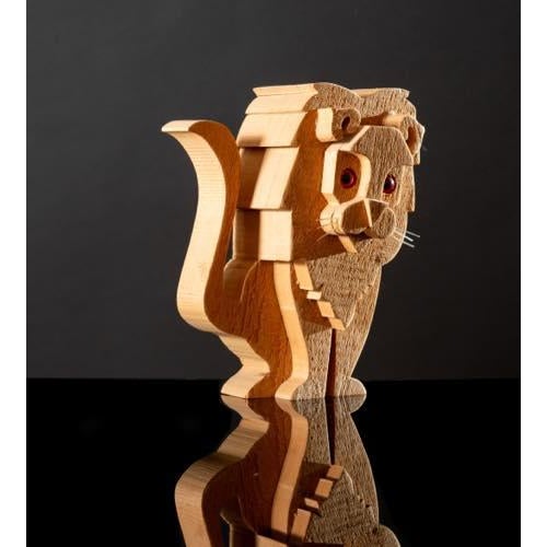 Lion wood sculpture Attributed to Bottega Michelangeli, Orvieto Italy 1970s composed of assembled wooden sections H cm 26...