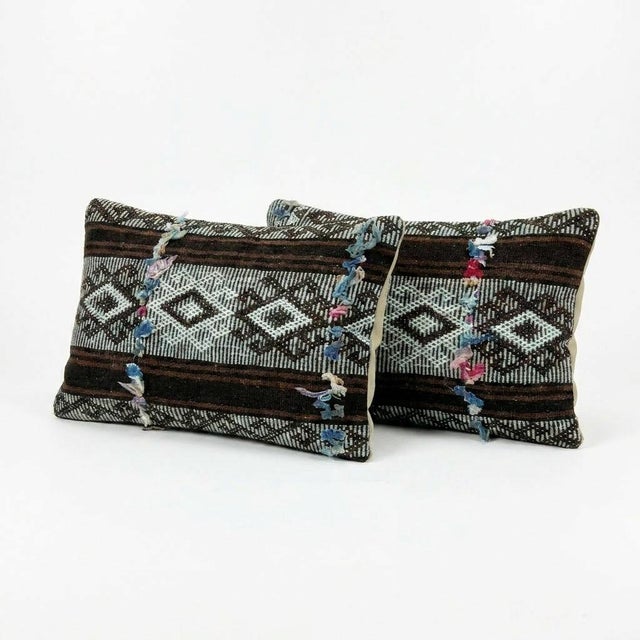 This beautiful 14'' x 20'' Turkish Kilim pillow cover set was made from authentic handwoven flatweave kilim. The...
