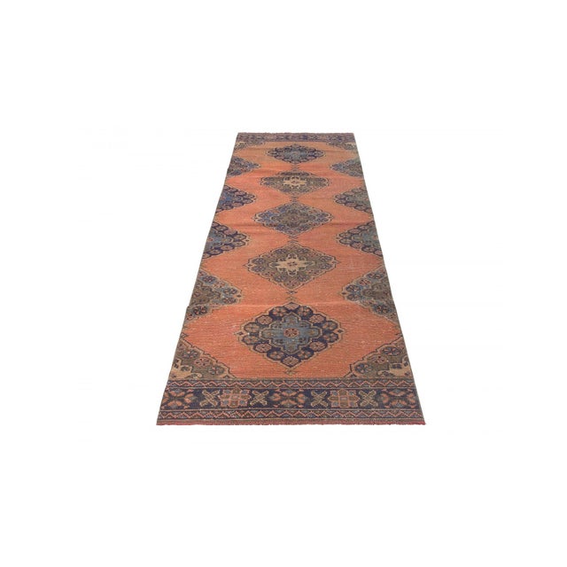 Decorative washed out handknotted vintage rug from Konya region of Turkey. Approximately 50-60 years old. In very good...