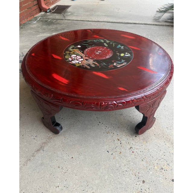 Discover the charm and elegance of this exquisite Antique Chinese Vermilion Lacquer Carved Coffee Table, a stunning...