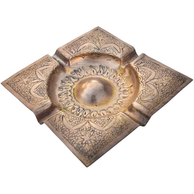 One-of-a-kind antique highly crafted and engraved Moroccan ashtray. Constructed of solid brass with ornate details.