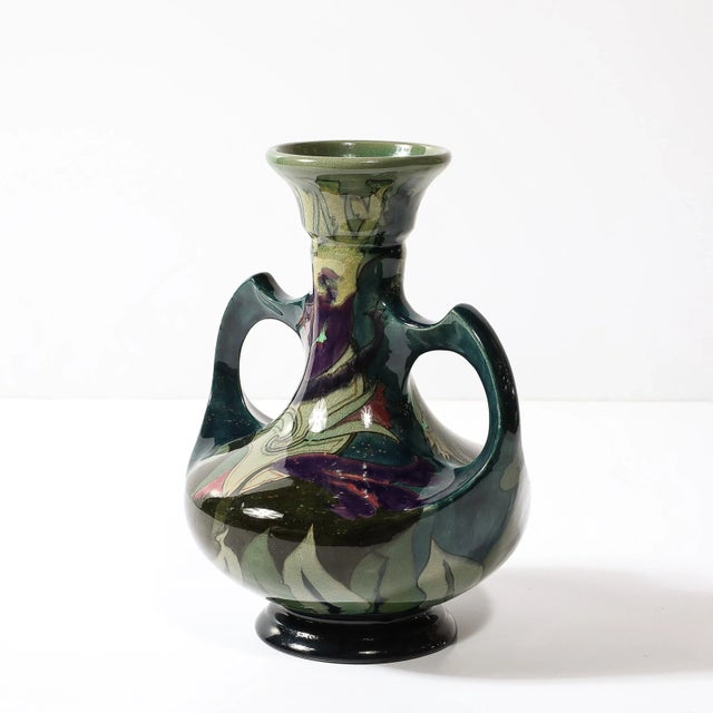 This highly unique Art Nouveau Hand-Painted Ceramic Vase Signed Gouda originates from the Netherlands, Circa 1910. This...