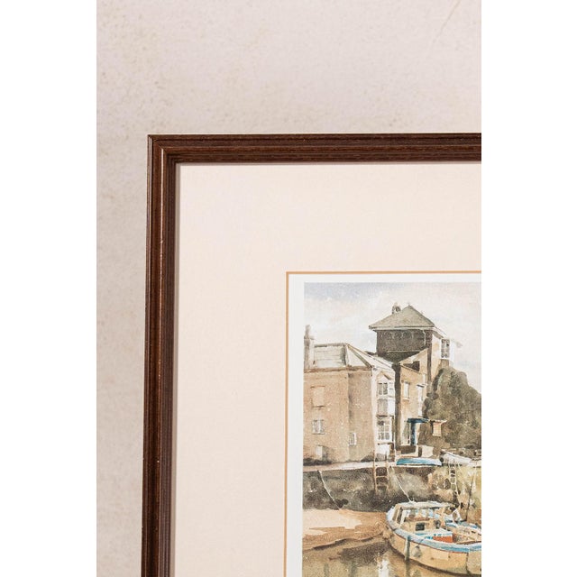 Original signed mid-century watercolor depicting Cornwall Harbour, presented in a frame. Soft washes of color and loose...